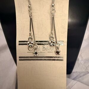 Elegant Silver Floral Star Earrings